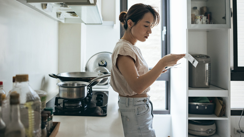 Woman reviewing bills