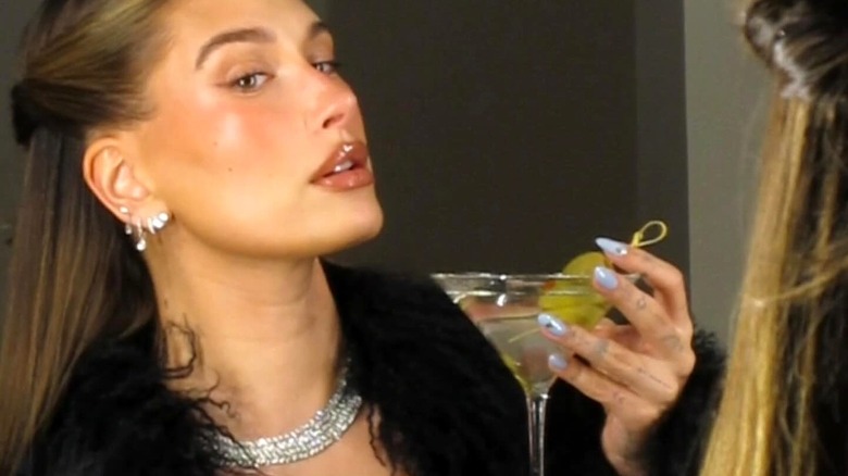 Hailey Bieber with olive nails