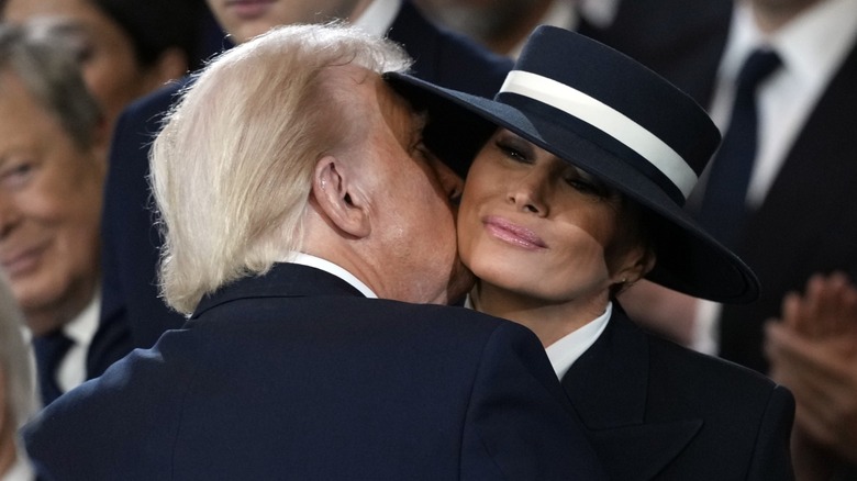 Donald Trump kissing Melania Trump on the cheek