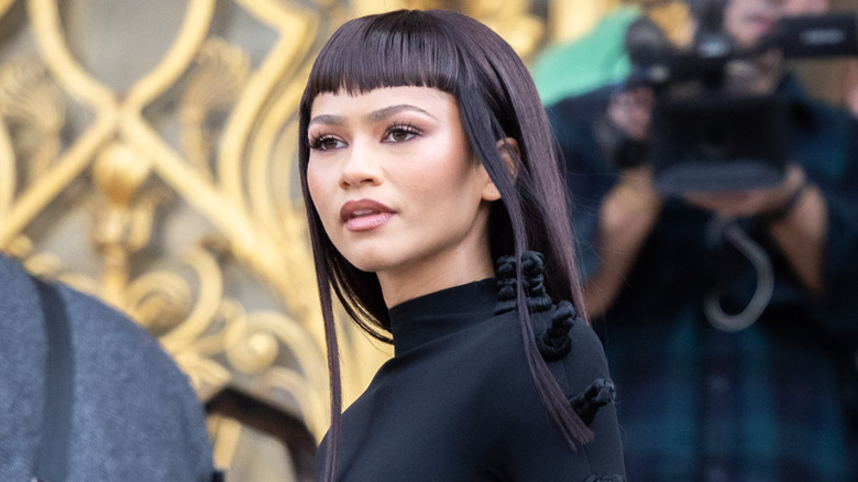 Zendaya posing with a sci-fi mini bangs ahead of 