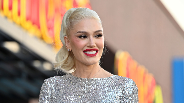 Gwen Stefani wearing a silvery dress