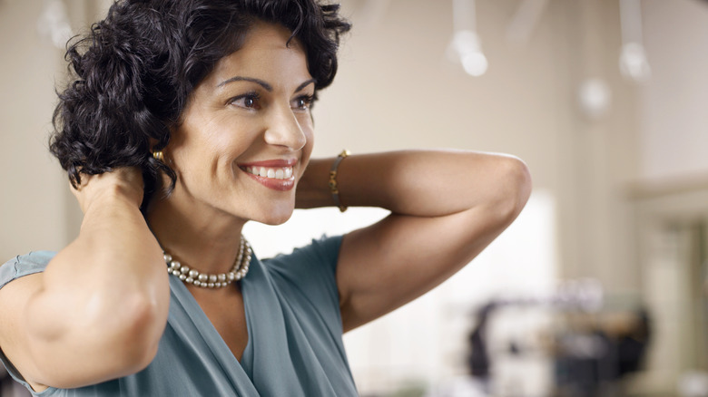 Woman wearing necklace