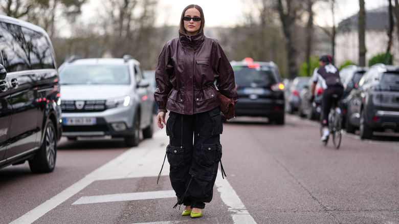 Paris Fashion Week guest wearing kitten heels and black pants