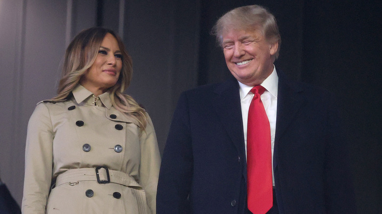 Melania Trump in a camel coat with Donald Trump in a suit