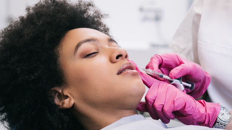 woman getting botox in jaw