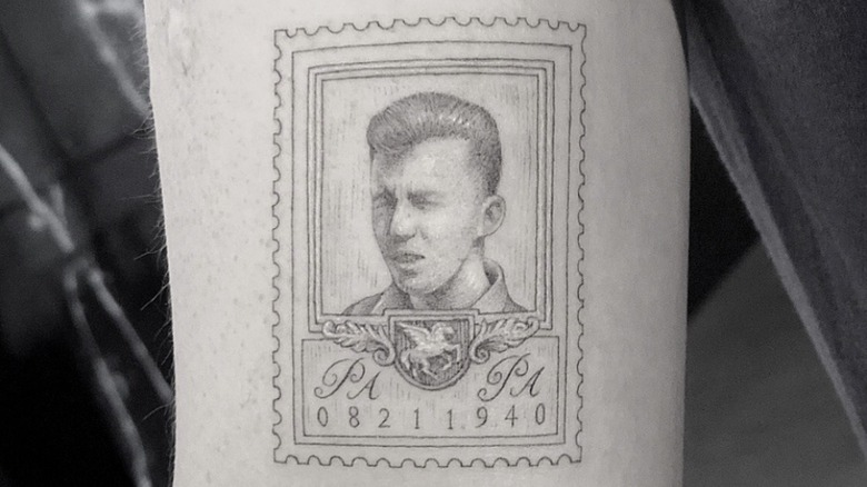 Joe Jonas' arm with portrait tattoo