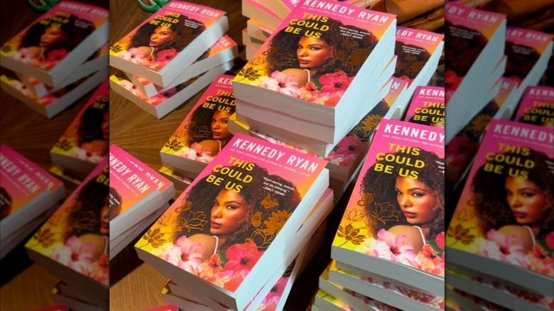 Several stacks of "This Could Be Us" by Kennedy Ryan