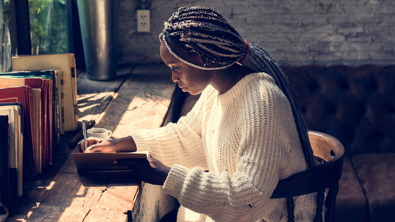 woman keeping journal