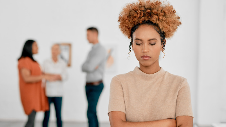 woman standing alone