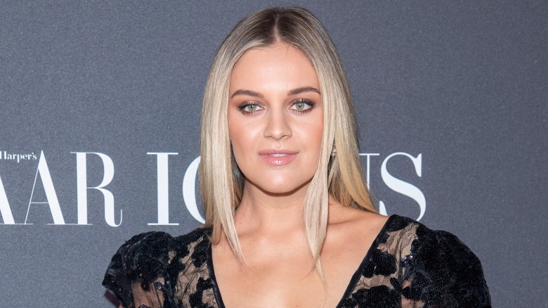 Kelsea Ballerini posing