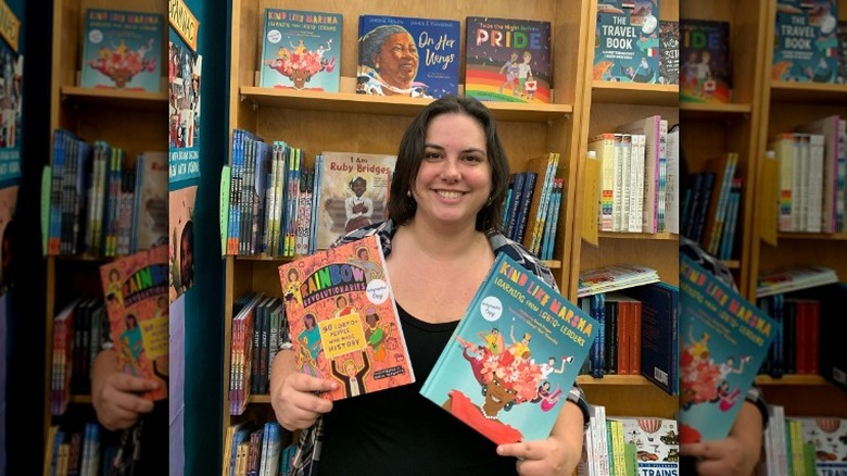 Sarah Prager holding two of her books