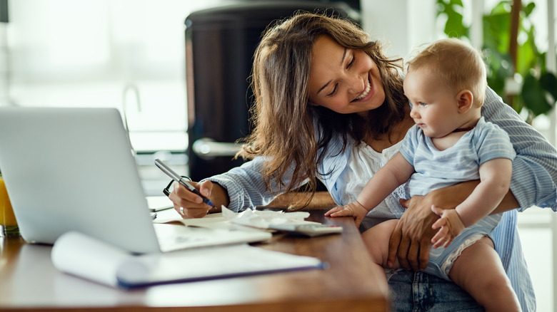 Woman holding a child