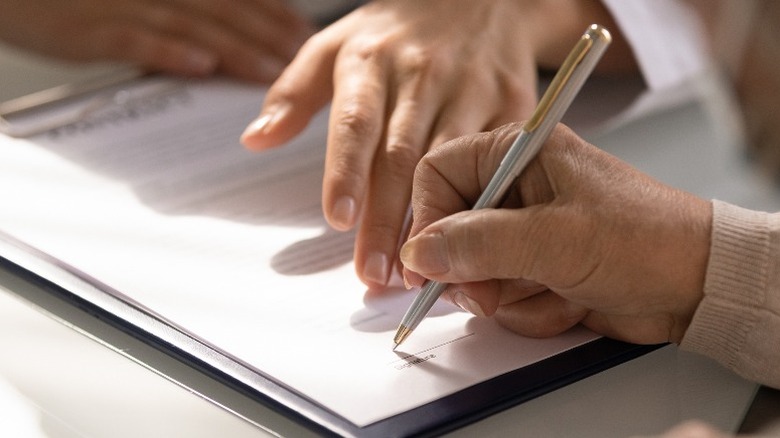 Signing informed consent form