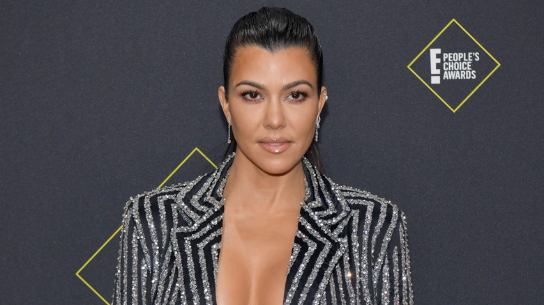 Kourtney Kardashian posing