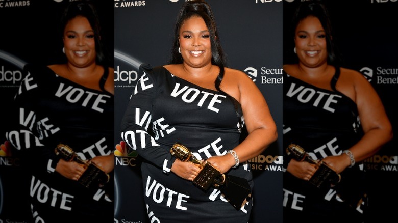 Lizzo on red carpet, VOTE dress