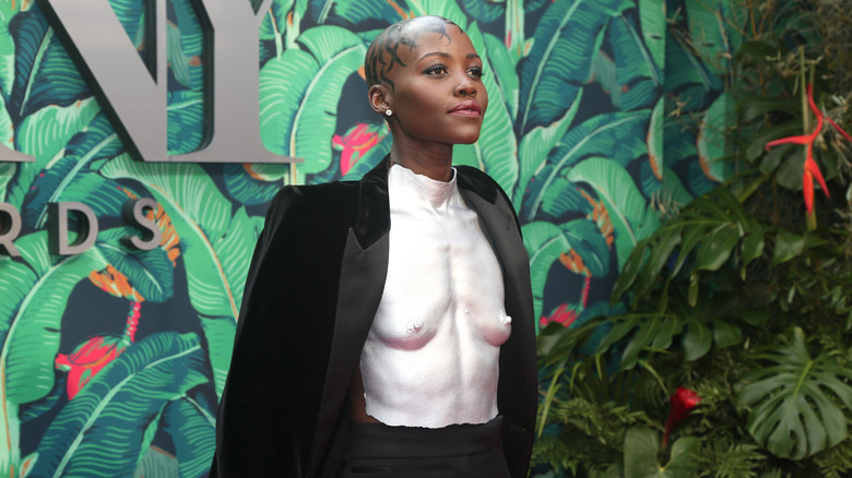 Lupita Nyong'o wearing breastplate