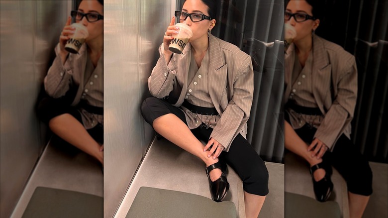 Woman wearing Mary Janes and black capri pants