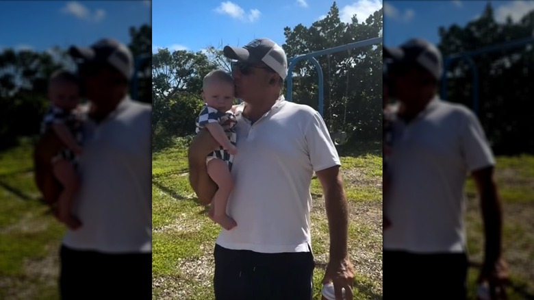 Nicholas Riccio with his son