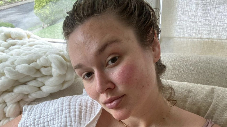 Woman posing for Olay