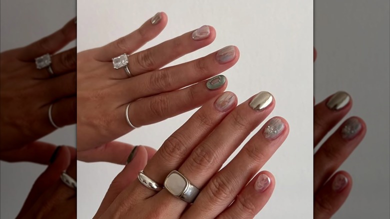 A chrome and opal manicure on Instagram