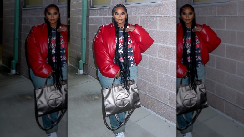 Woman holding an oversized bag