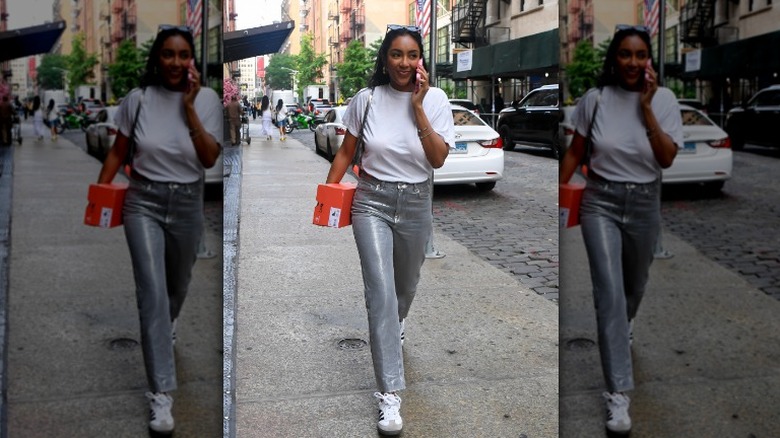 Woman wearing metallic jeans