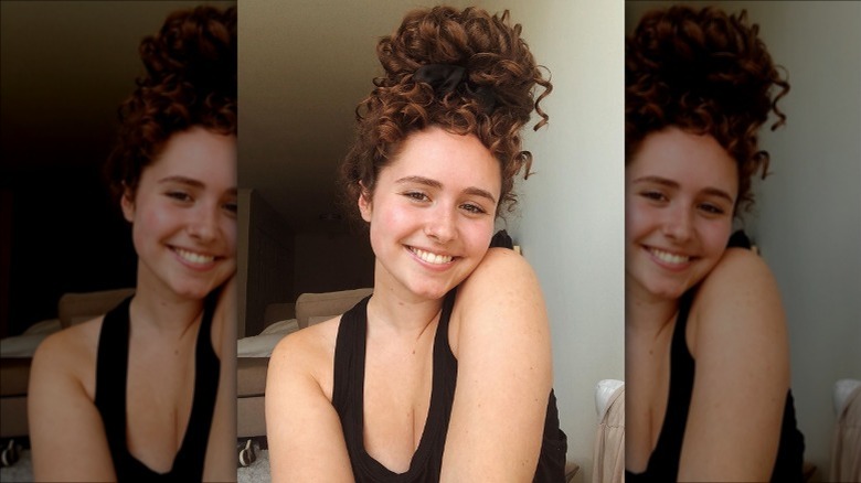 Woman with red hair smiling