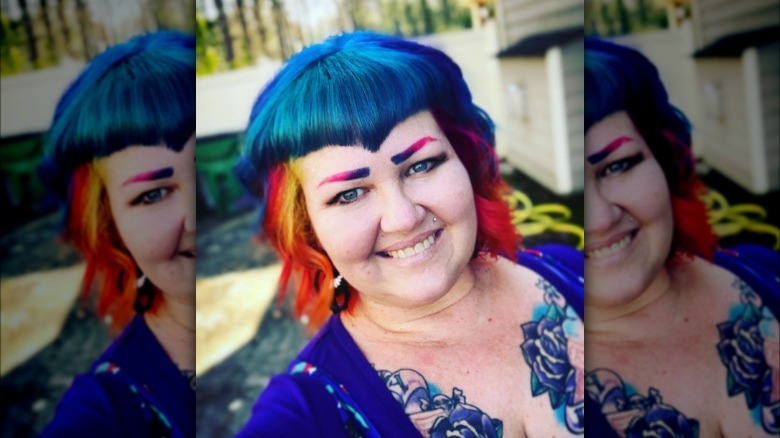 Woman with pointed bangs