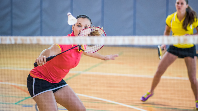 women playing badminton 
