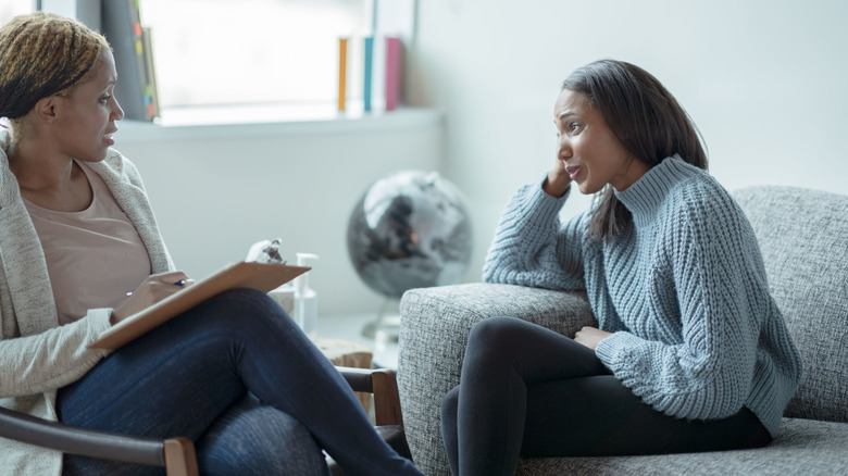 crying woman in therapy