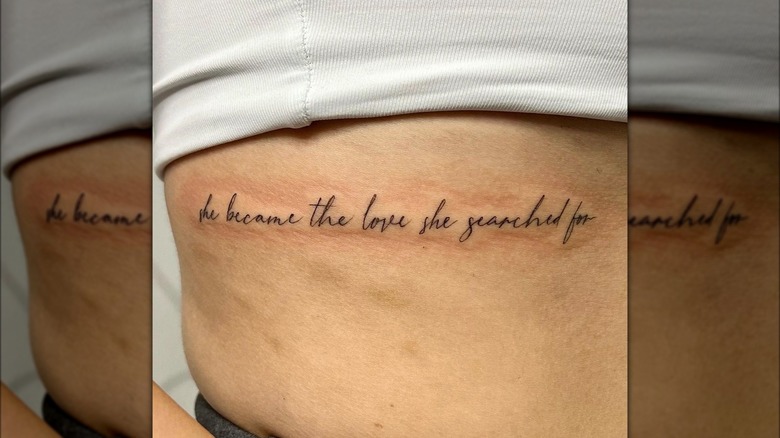 script tattoo on body