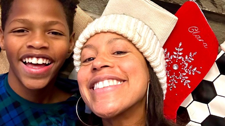 Sheinelle Jones posing with her son without makeup