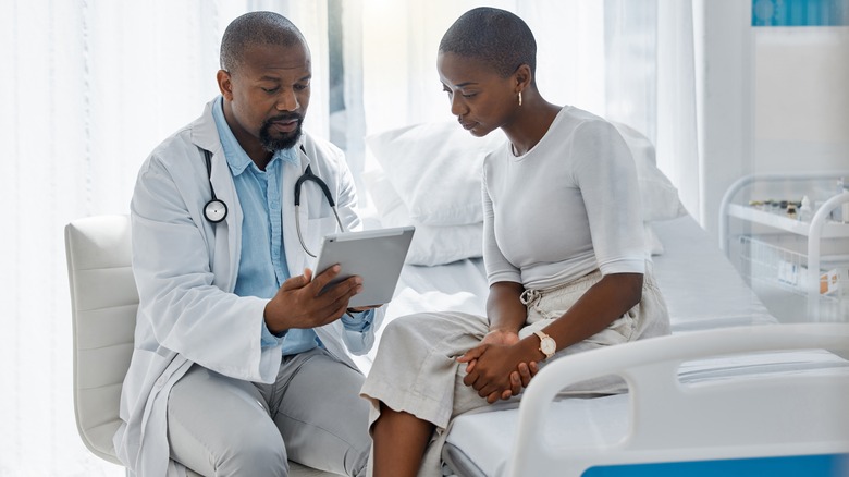 Doctor showing results