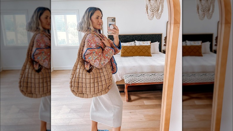 Woman with a slouchy bag