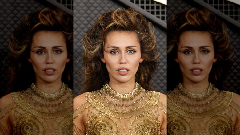 Miley Cyrus with teased hair on the red carpet