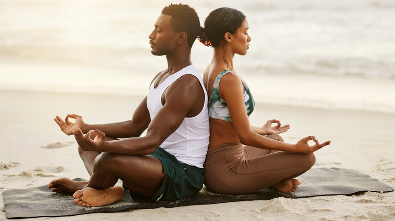 Couple meditating together