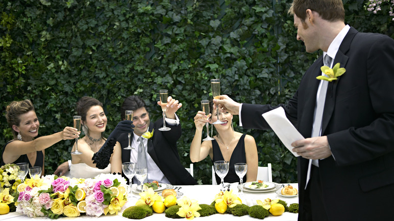 Bridal party cheers-ing