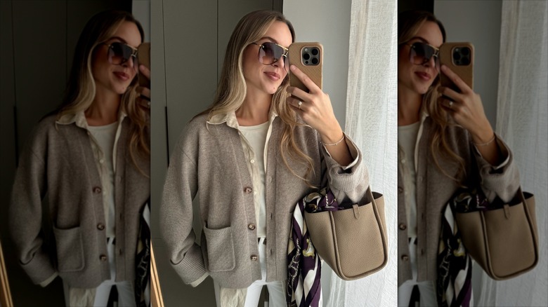 A woman in a linen shirt and cardigan