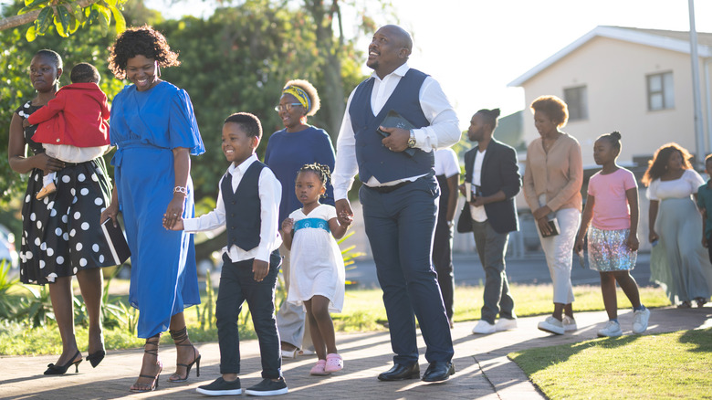 Family walking into church