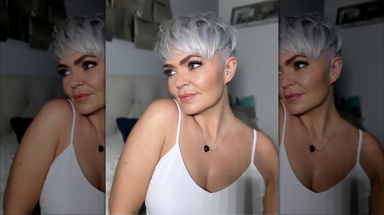 Woman with an asymmetric pixie cut