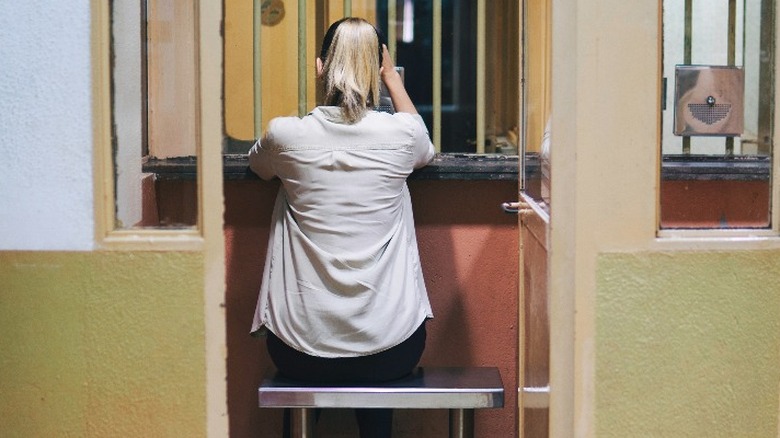Woman waiting for a visit in prison