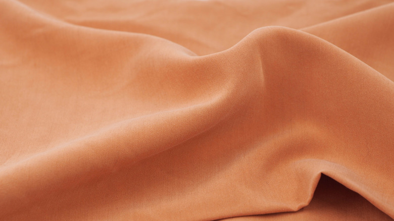 Close-up or orange modal fabric