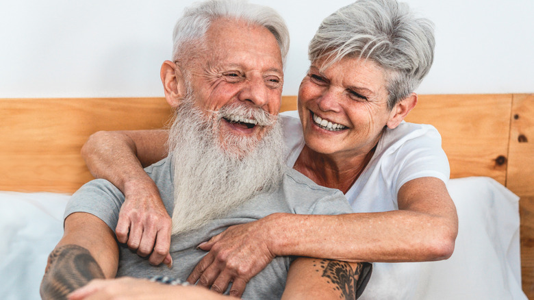 Mature couple laughing