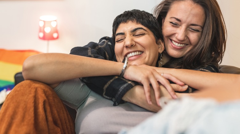 Lesbian couple on couch