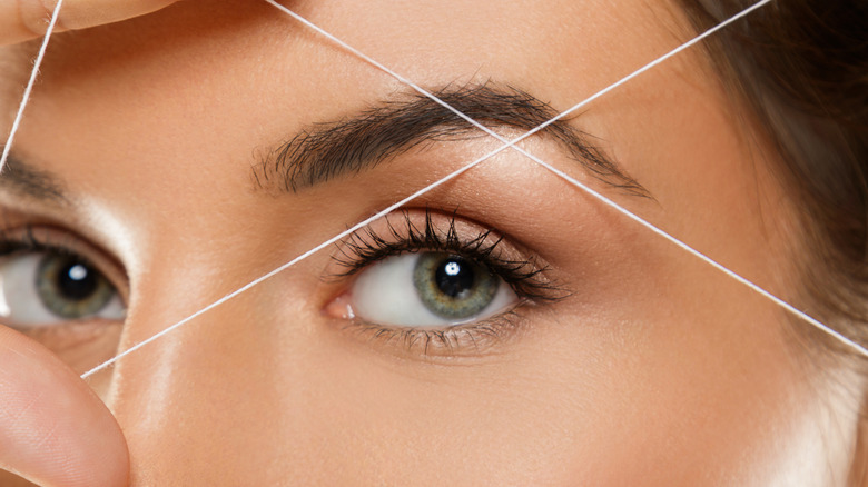 Eyebrow threading