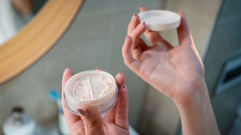 Woman holding powder
