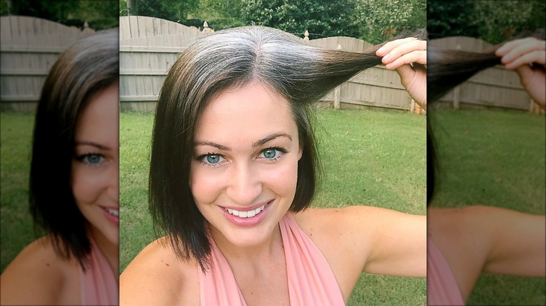 Woman with gray roots