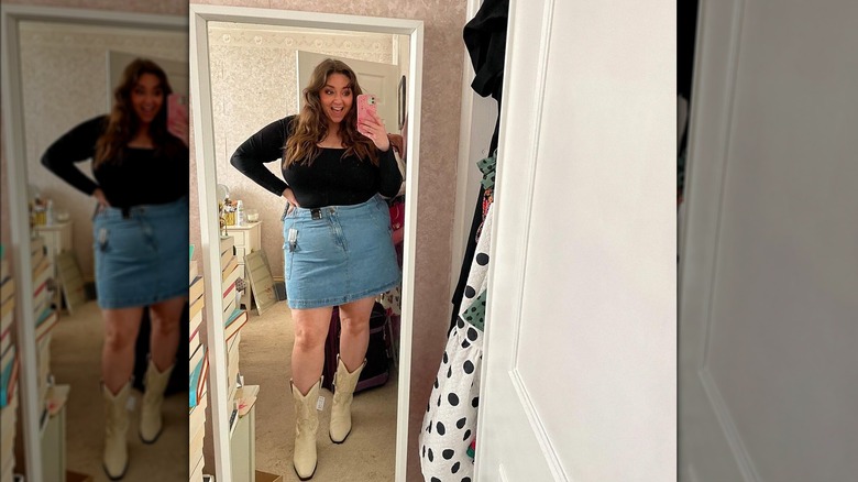 Woman in denim skirt