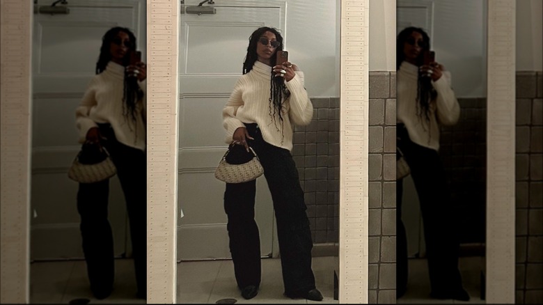 Woman wearing black boots