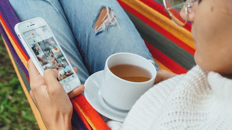 Woman scrolling on phone
